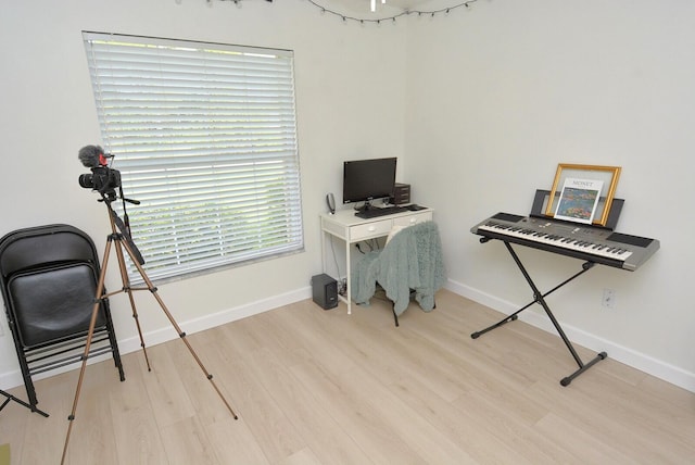 office space with hardwood / wood-style floors and plenty of natural light