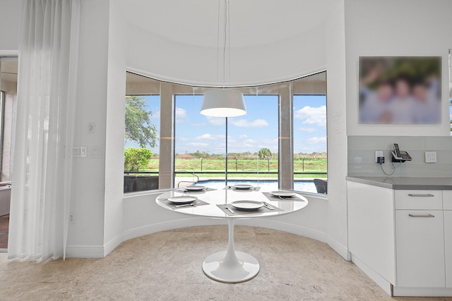 dining space with a healthy amount of sunlight