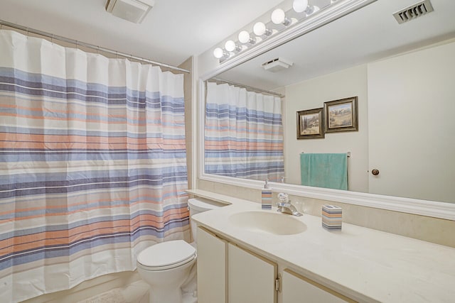 full bathroom with tile patterned floors, vanity, shower / bath combo, and toilet