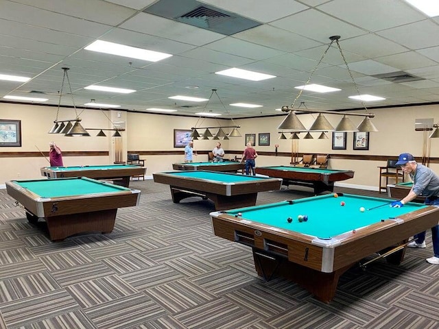 game room with dark colored carpet, a drop ceiling, and pool table