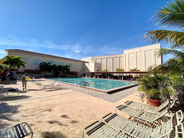 view of swimming pool featuring a patio