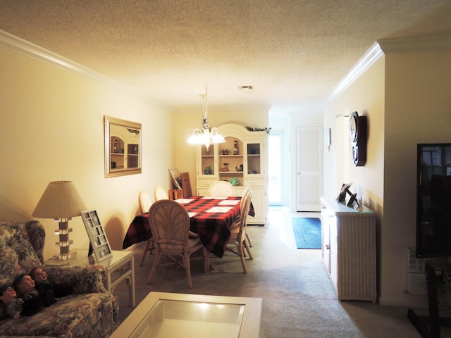 carpeted dining area with an inviting chandelier, a textured ceiling, and crown molding