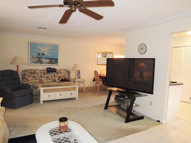 living room featuring ceiling fan with notable chandelier, a textured ceiling, and light colored carpet