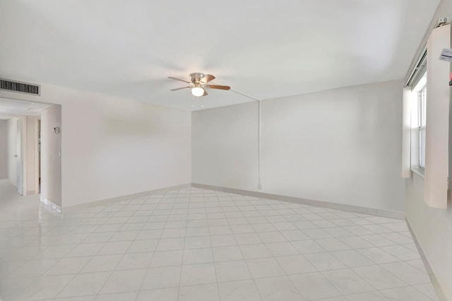 spare room with ceiling fan