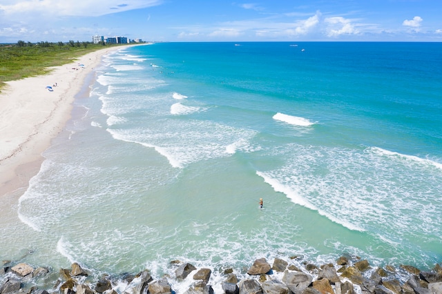 view of water feature with a beach view