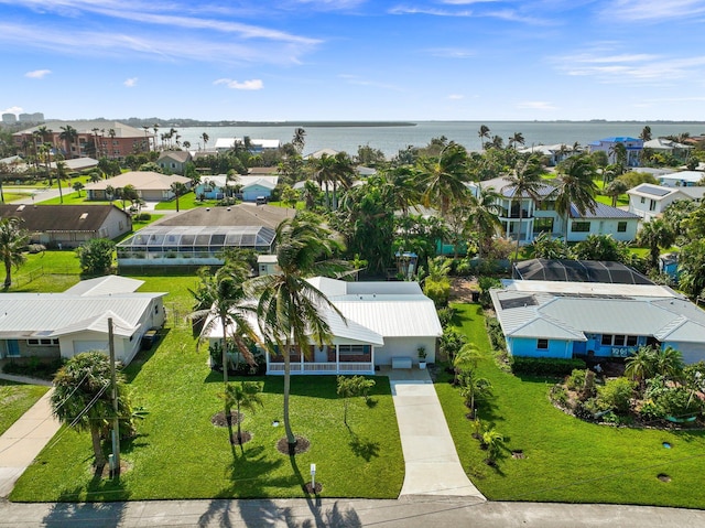 drone / aerial view with a water view