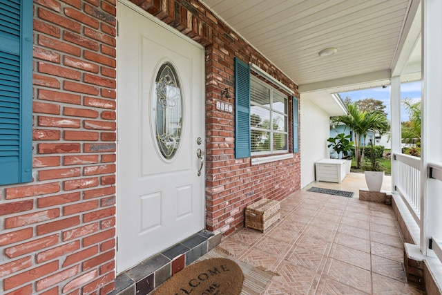 property entrance featuring covered porch