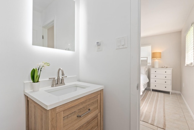 bathroom with vanity and tile patterned floors