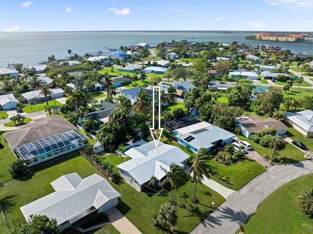 birds eye view of property featuring a water view