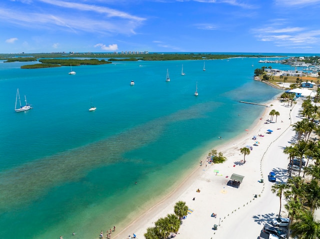 aerial view with a beach view and a water view