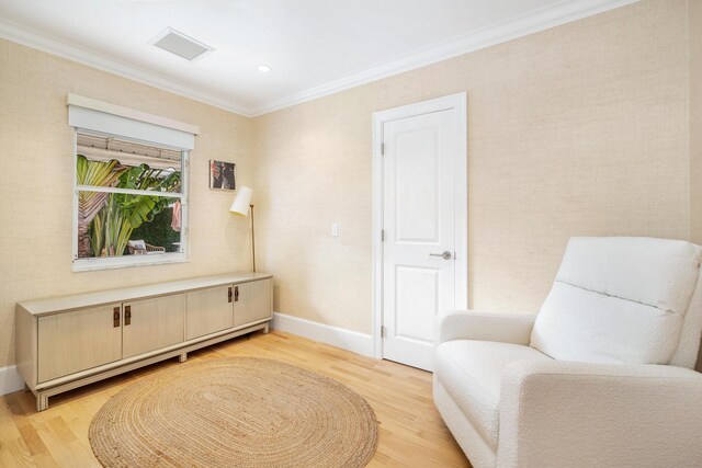 240 El Dorado Ln, Palm Beach, FL 33480 - sitting room featuring light wood-style floors, ornamental molding, and baseboards