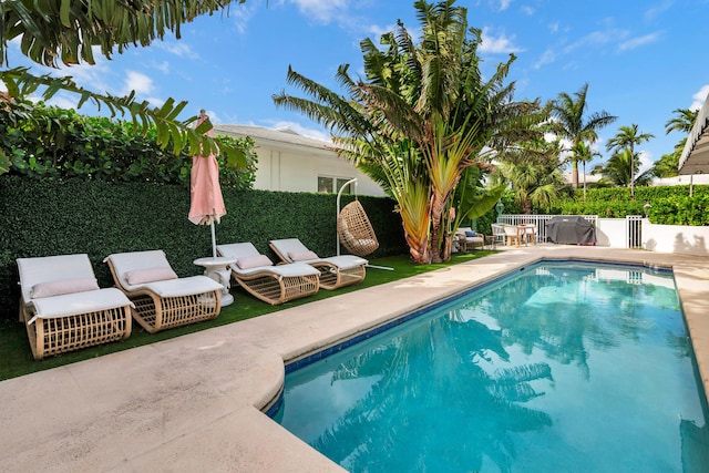 240 El Dorado Ln, Palm Beach, FL 33480 - view of swimming pool with fence and a patio