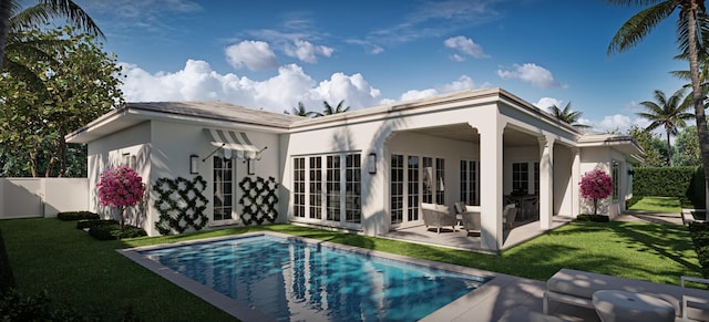 240 El Dorado Ln, Palm Beach, FL 33480 - back of property featuring stucco siding, a patio area, and a lawn