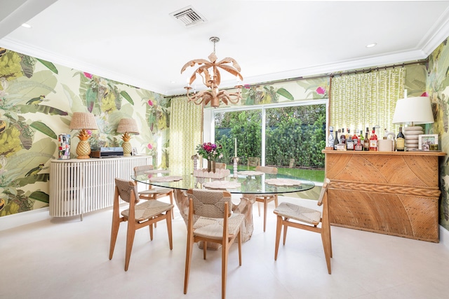 dining room featuring an inviting chandelier and crown molding