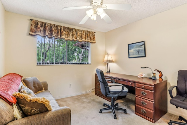 office with ceiling fan, light colored carpet, and a textured ceiling