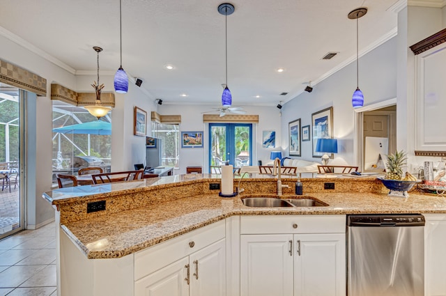 kitchen with white cabinets, dishwasher, and ornamental molding