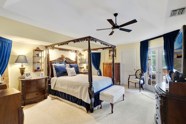 bedroom featuring ceiling fan, access to exterior, french doors, and light colored carpet