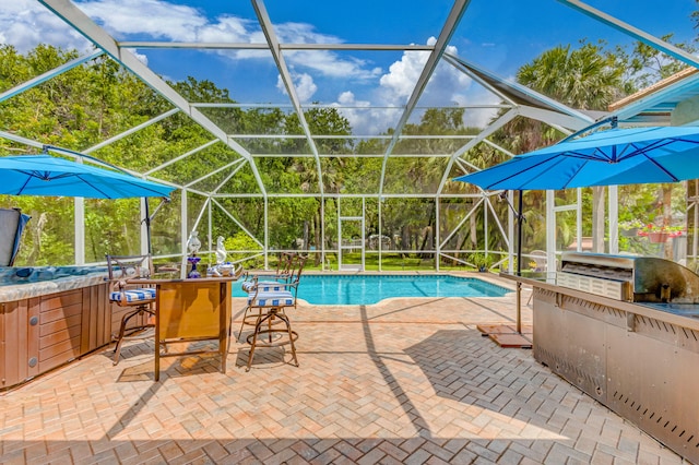 view of swimming pool with a lanai, a patio, and a bar