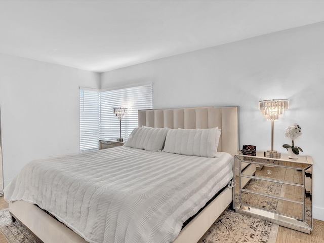 bedroom with light wood-type flooring