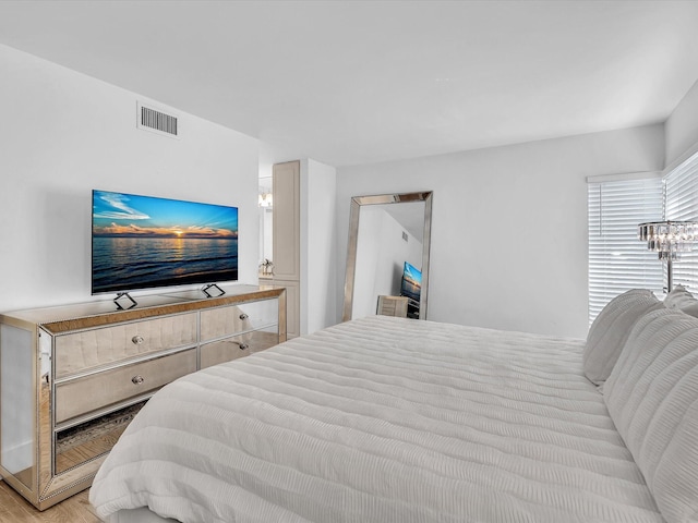 bedroom featuring light wood-type flooring