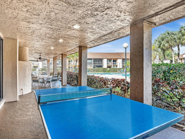 view of patio / terrace with a pool