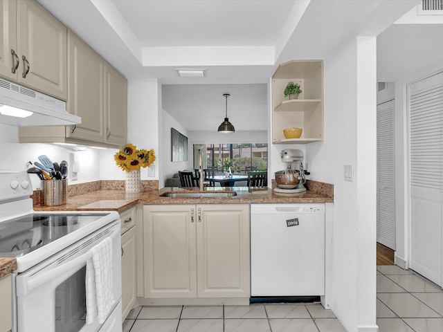 kitchen featuring sink, light tile patterned floors, white appliances, and range hood