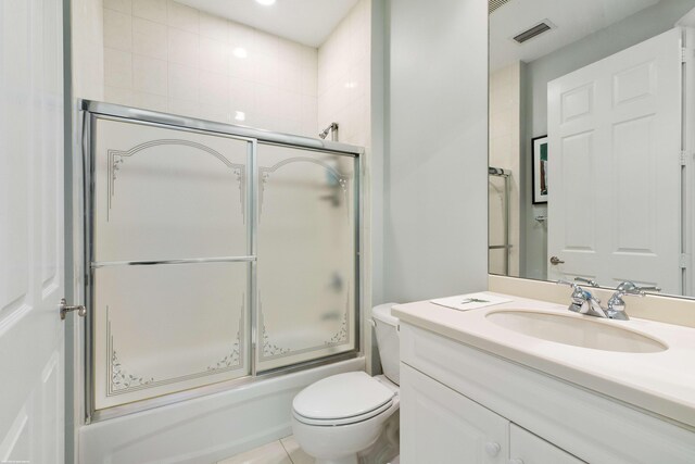 bathroom with vanity, tile patterned floors, and independent shower and bath