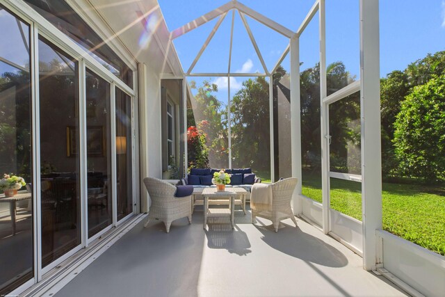 sunroom / solarium featuring sink