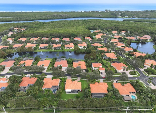 drone / aerial view featuring a water view