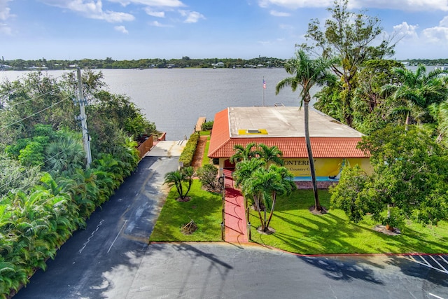 birds eye view of property featuring a water view