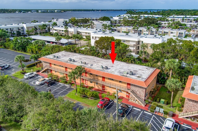 birds eye view of property featuring a water view