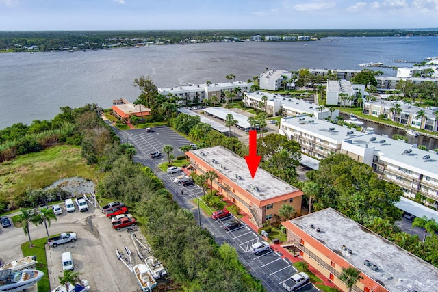 drone / aerial view featuring a water view