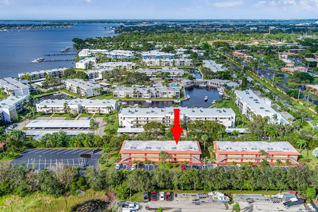 birds eye view of property featuring a water view