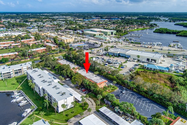 birds eye view of property featuring a water view