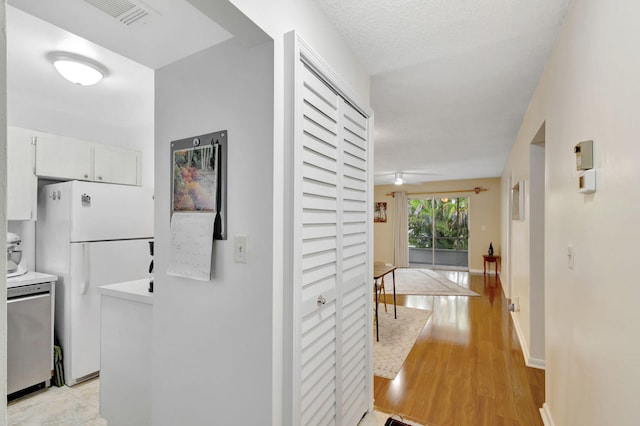 hallway featuring light hardwood / wood-style flooring