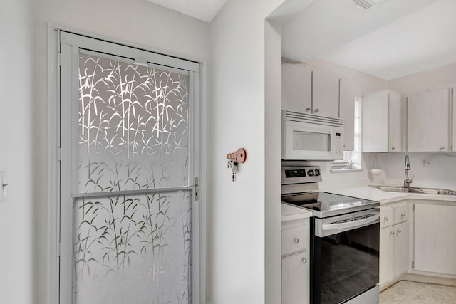 kitchen with stainless steel electric range oven and sink