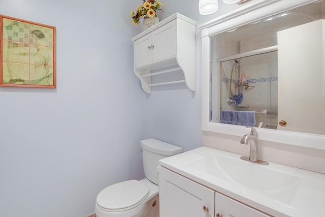 13735 Flora Pl Unit C, Delray Beach, FL 33484 - bathroom with a tile shower, toilet, and vanity