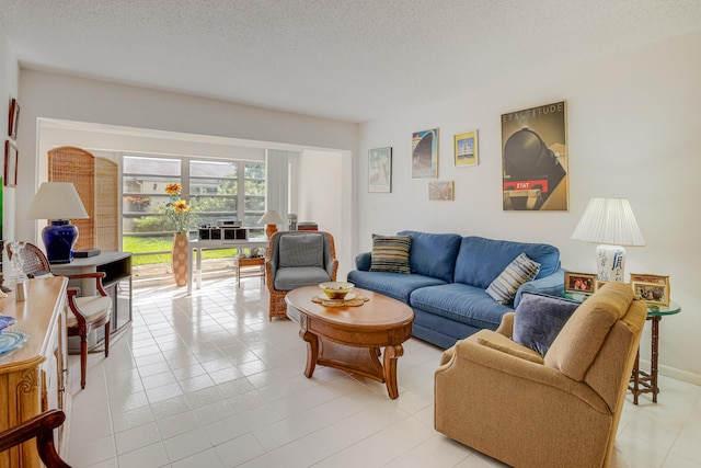 tiled living room with a textured ceiling