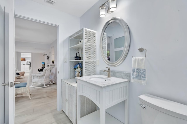 3140 NW 15th St, Delray Beach, FL 33445 - bathroom with wood finished floors and vanity