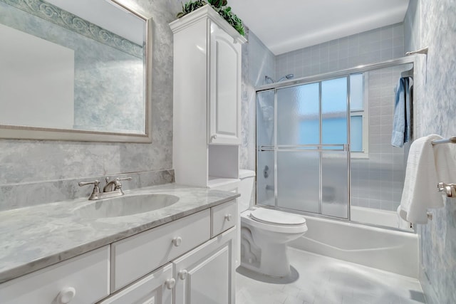 3140 NW 15th St, Delray Beach, FL 33445 - bathroom featuring vanity and combined bath / shower with glass door