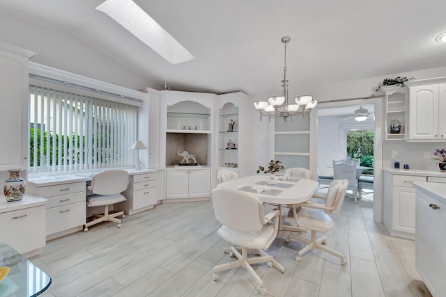 3140 NW 15th St, Delray Beach, FL 33445 - dining area with a skylight, a desk, vaulted ceiling, a chandelier, and a ceiling fan