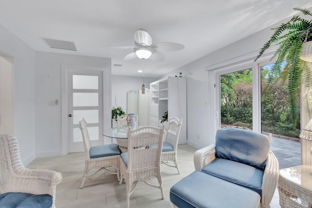 dining area with ceiling fan