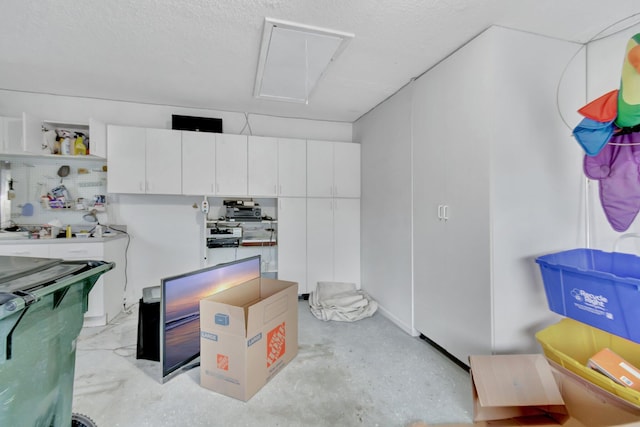 kitchen featuring white cabinets