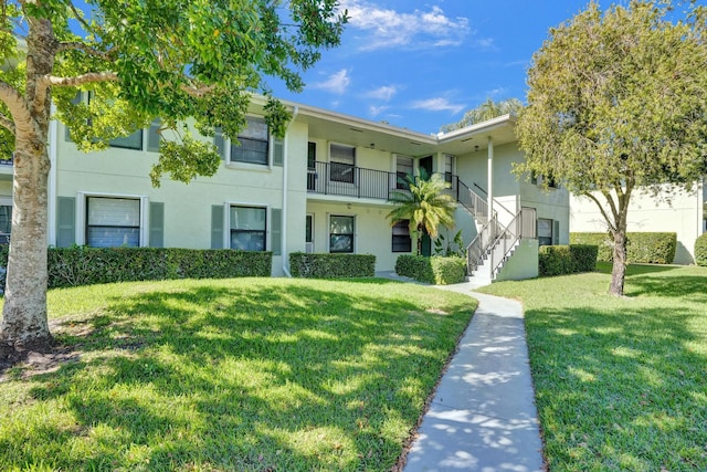 1701 Sabal Ridge Cir Unit G, Palm Beach Gardens, FL 33418 - view of building exterior featuring stairs