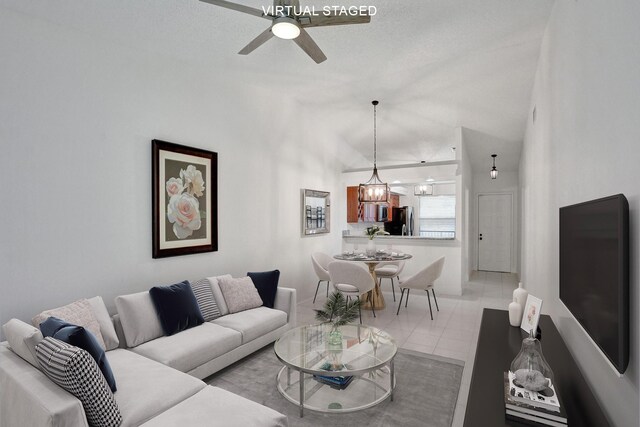 1701 Sabal Ridge Cir Unit G, Palm Beach Gardens, FL 33418 - living area featuring ceiling fan, a chandelier, and light tile patterned floors