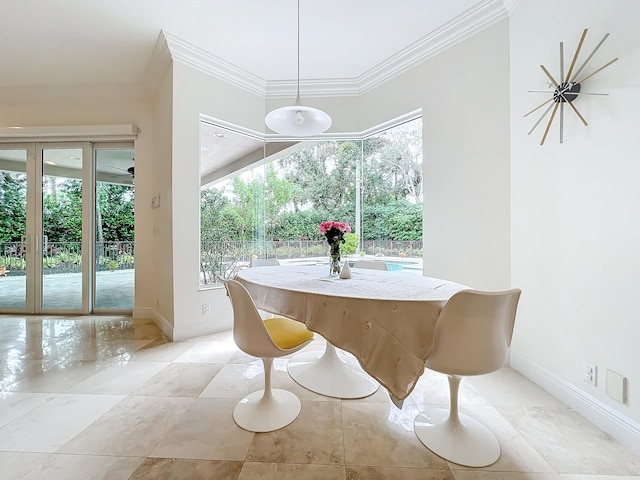 dining area with ornamental molding