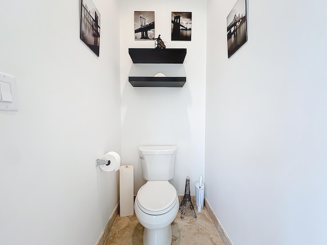 bathroom featuring toilet