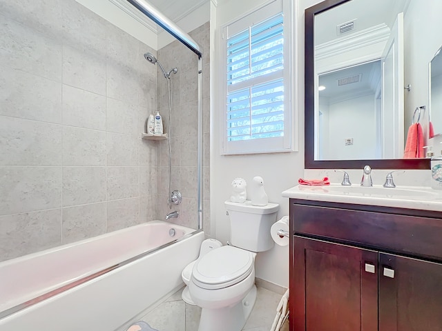 full bathroom with vanity, tile patterned floors, tiled shower / bath, and toilet