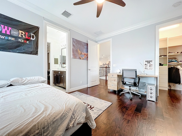 bedroom with ensuite bath, ceiling fan, dark hardwood / wood-style floors, a closet, and a spacious closet