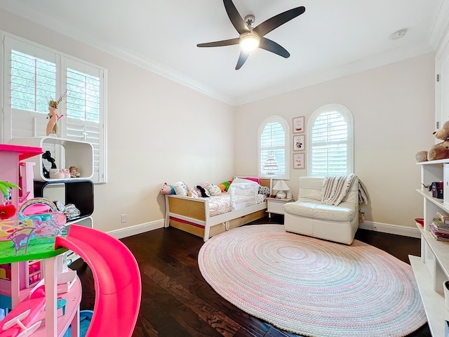 bedroom featuring dark wood-type flooring, ceiling fan, and crown molding